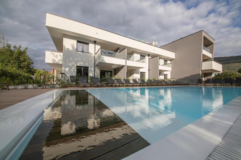 Outdoor pool and modern architecture of Riva Lake Lodge